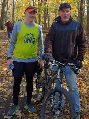 Riding his bike 6 miles with me during my 2020 virtual NYC Marathon